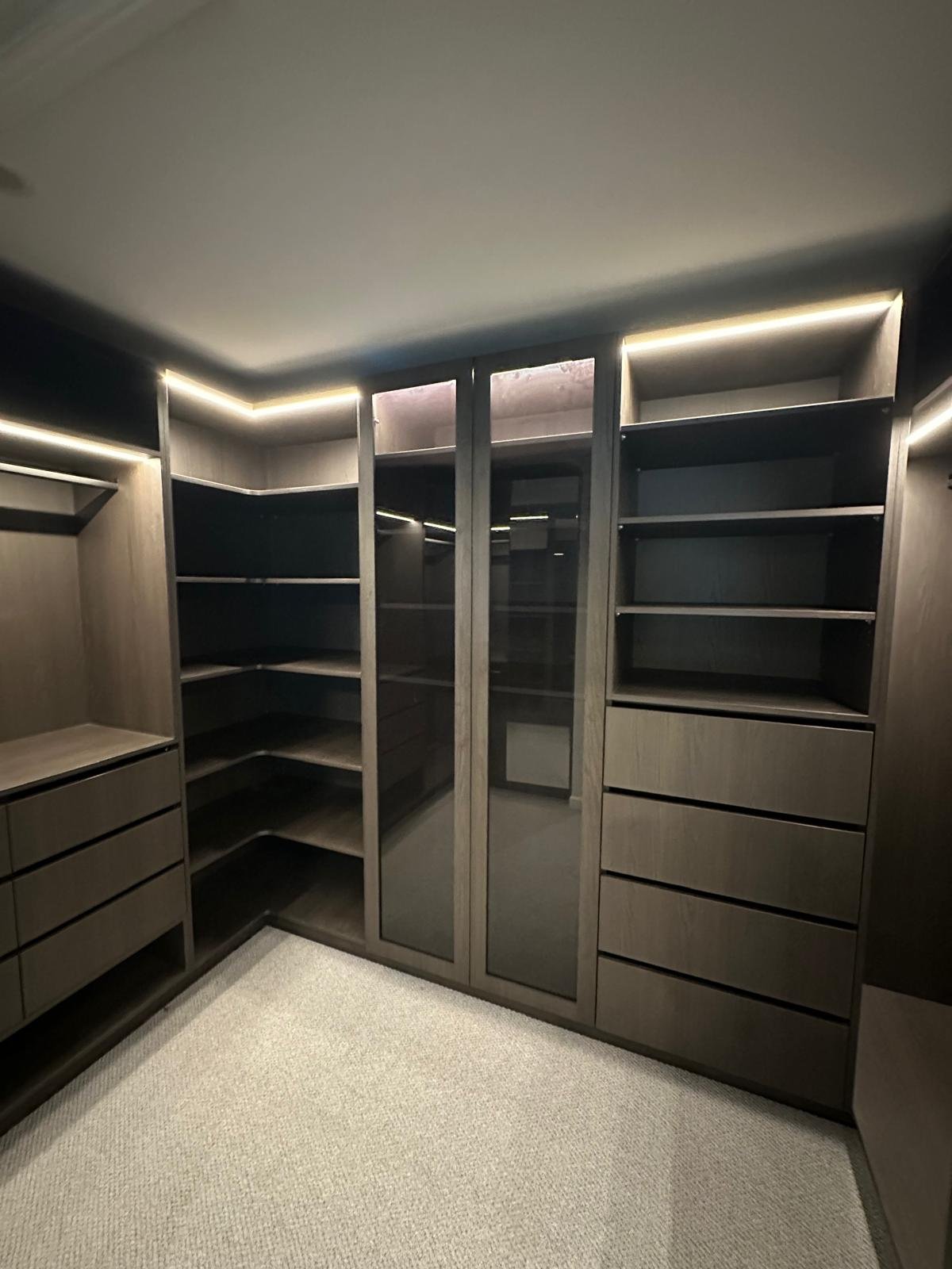 Corner view of walk-in robe LED lighting installation in Melbourne home by Cityline Electrical